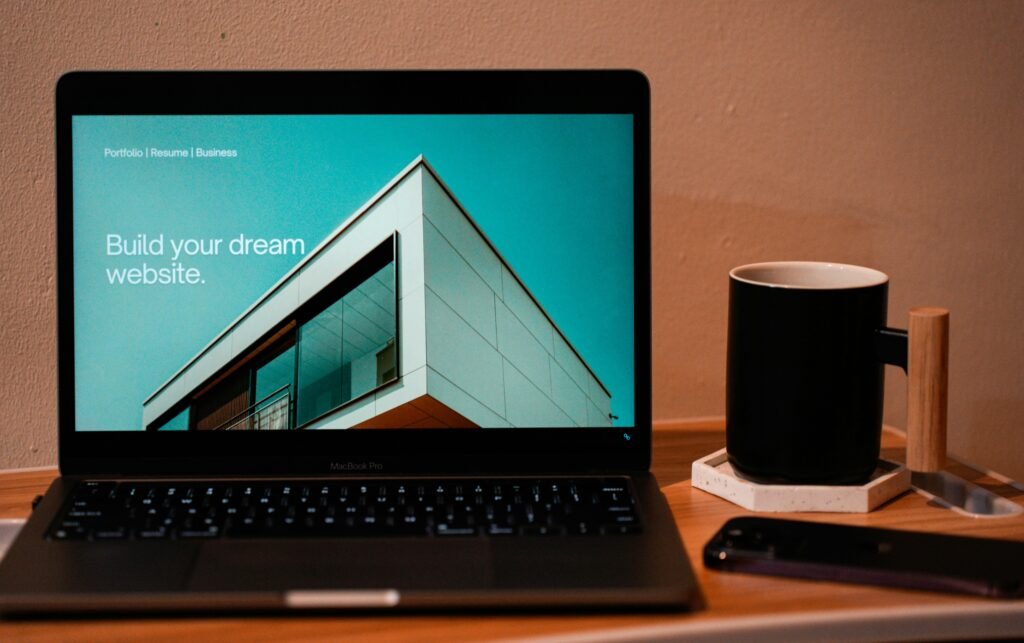 Website displayed on a laptop